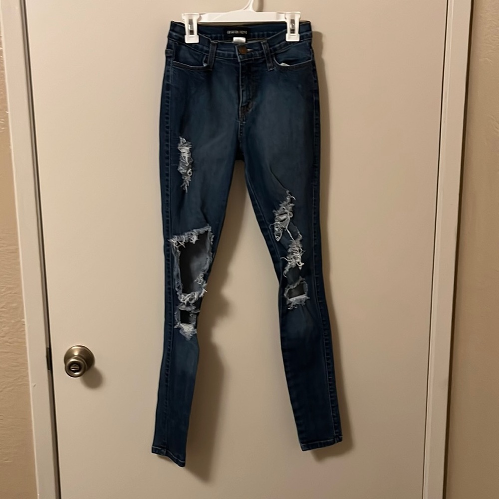 Dark blue high rise denim jeggings with rips size 3